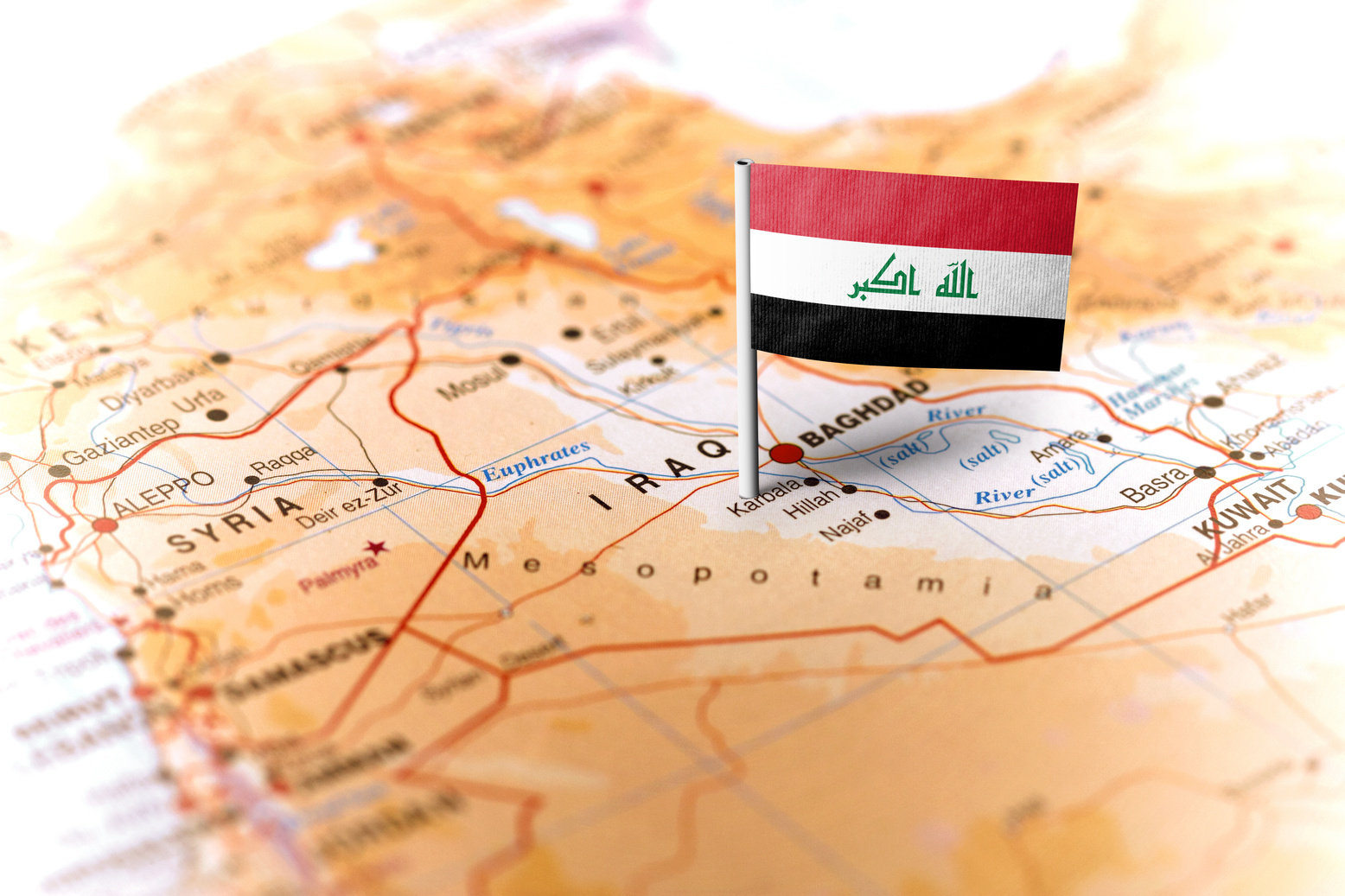 Iraq pinned on the map with flag